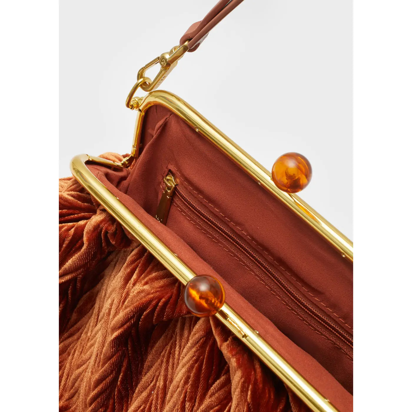 Brown vintage style brown velvet handbag with a gold snap clasp 