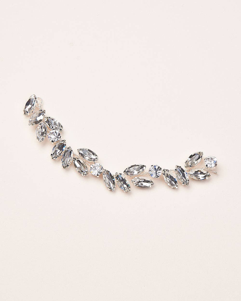 Add a radiant touch of glamour to your wedding day ensemble with the Skyla Crystal Headpiece—a breathtaking accessory designed to dazzle with every step you take. Whether you're envisioning a romantic garden ceremony or an elegant ballroom affair, Skyla brings a refined shimmer that enhances your bridal style with effortless beauty.