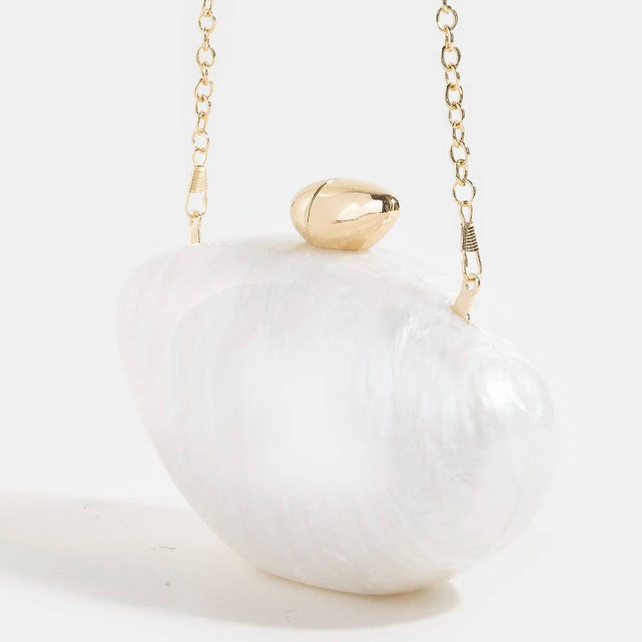 White pearlescent bridal clutch bag  on a white background