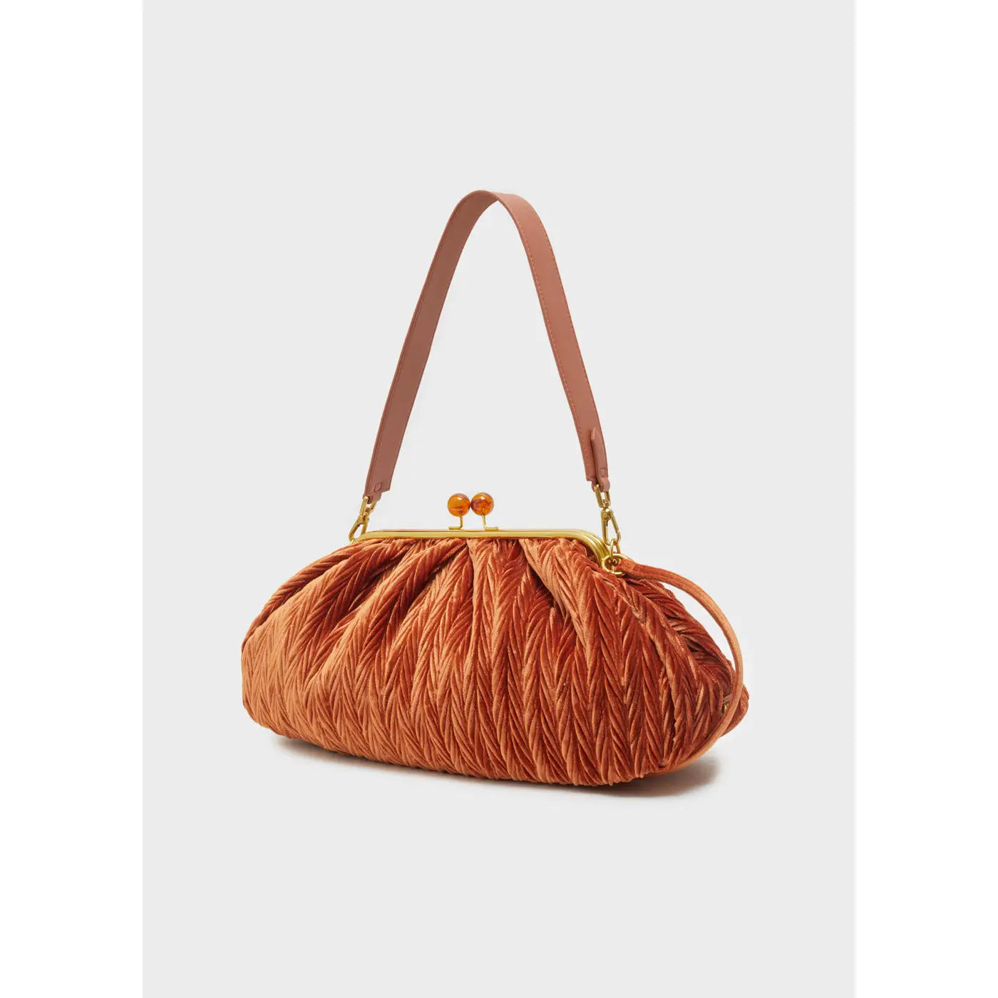 Brown vintage style brown velvet handbag with a gold snap clasp on a white background