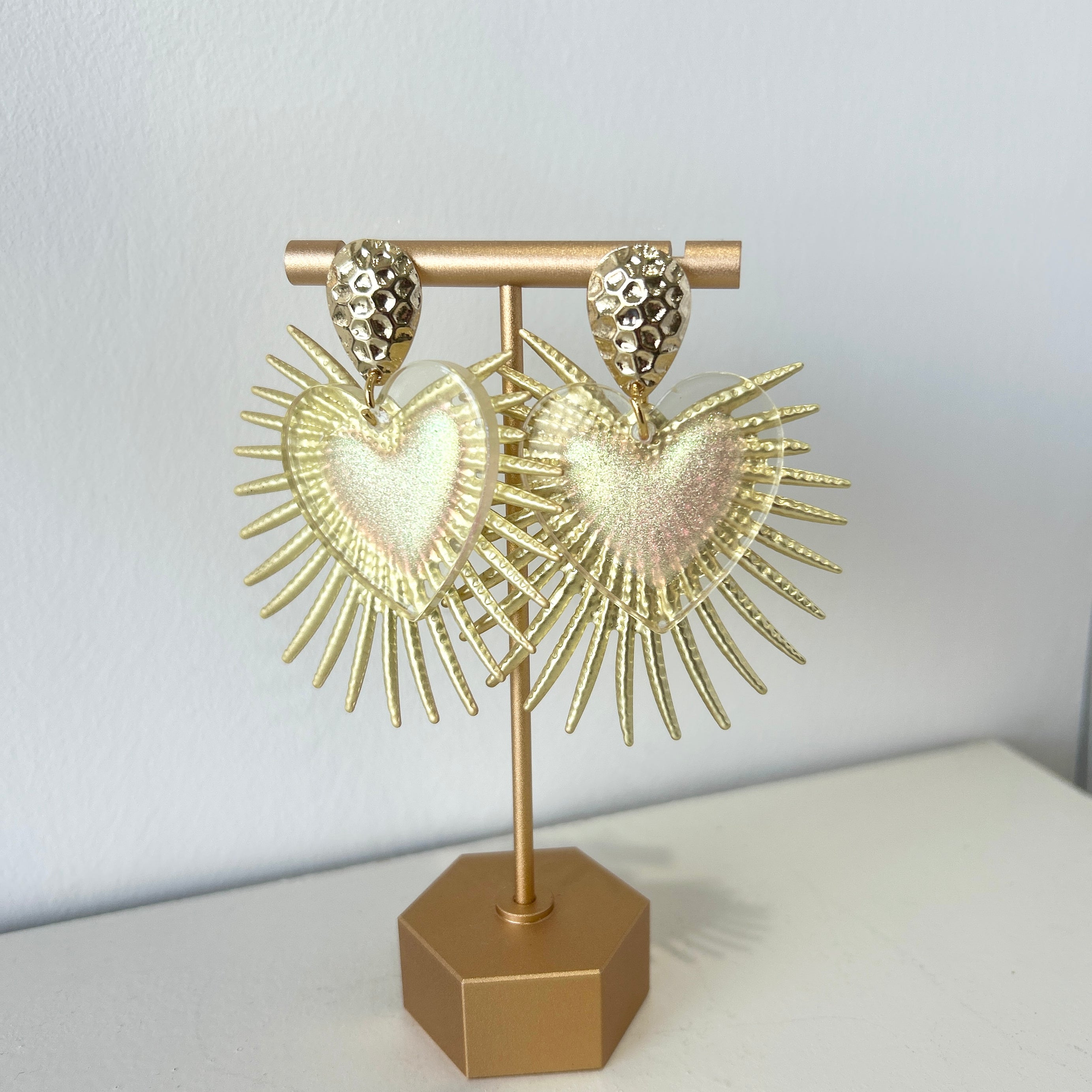 Gold heart shape statement earrings