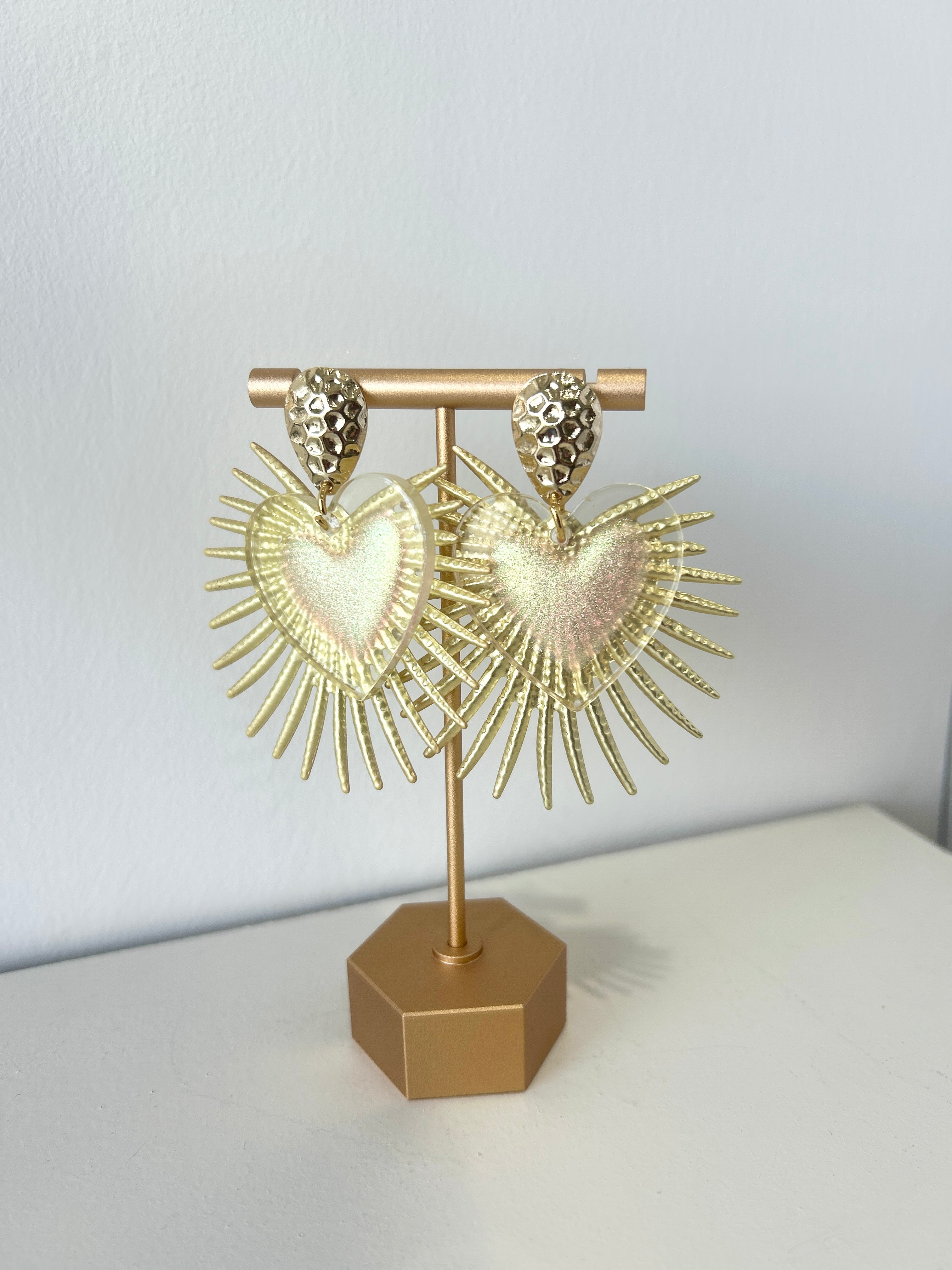 Gold heart shape statement earrings