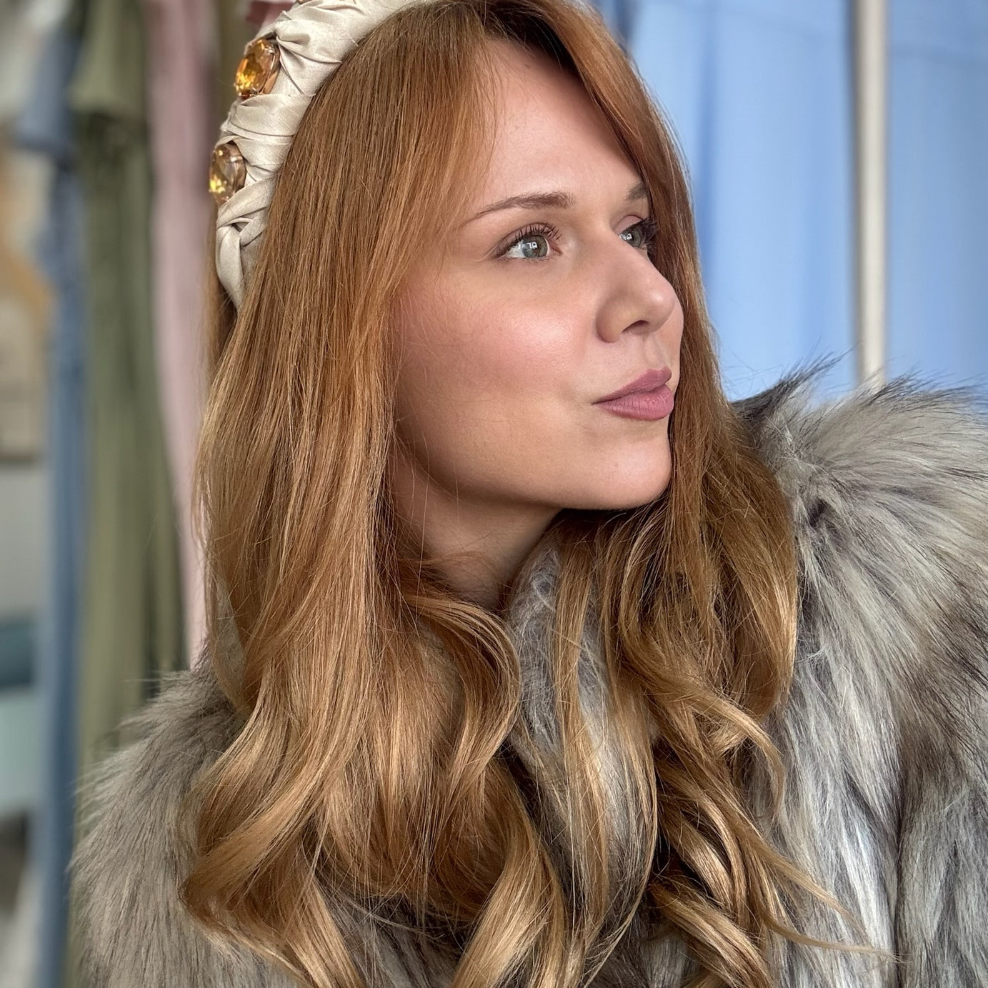 Lady wearing nude beige silk headband with crystals