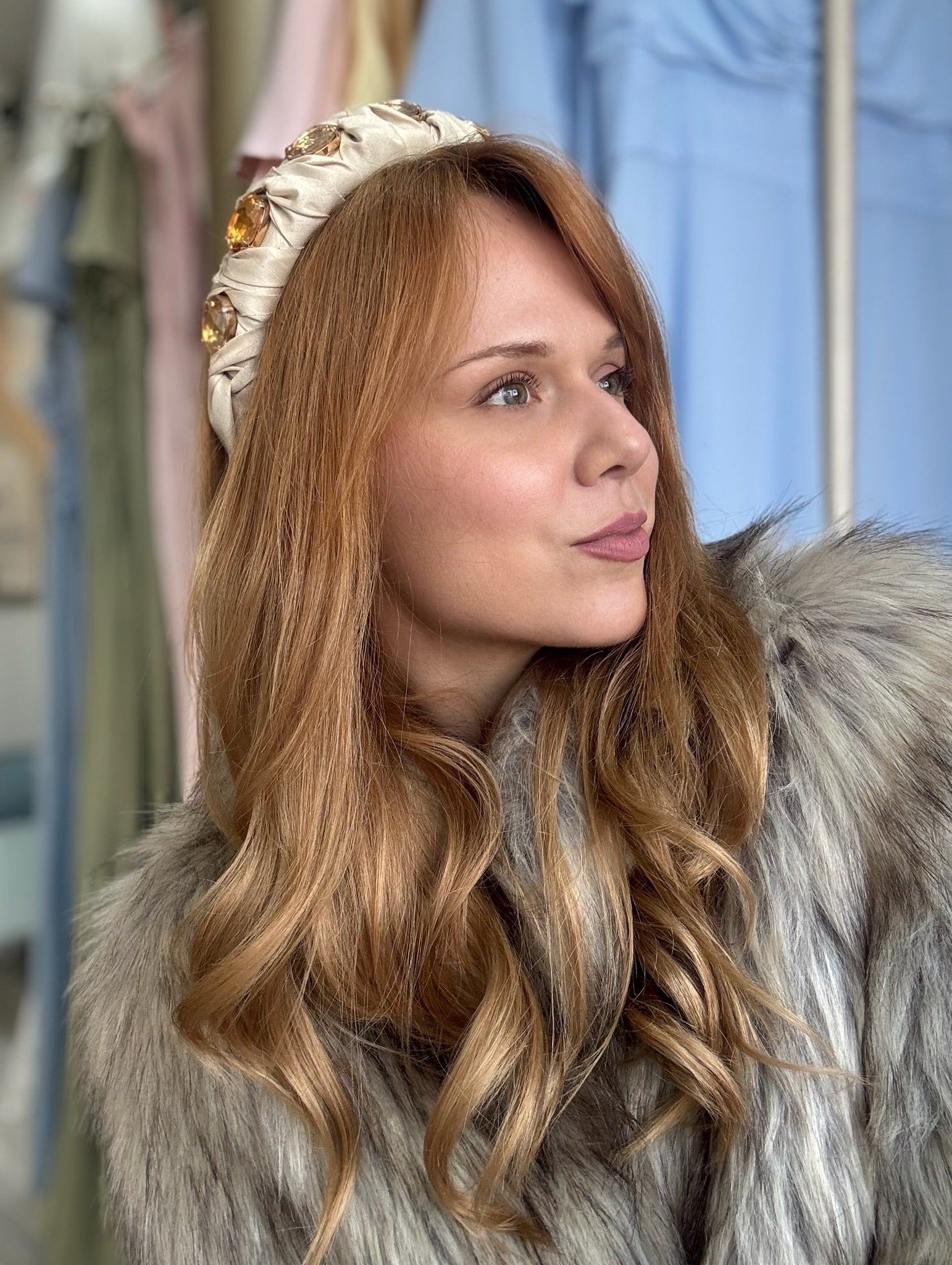 Lady wearing nude beige silk headband with crystals