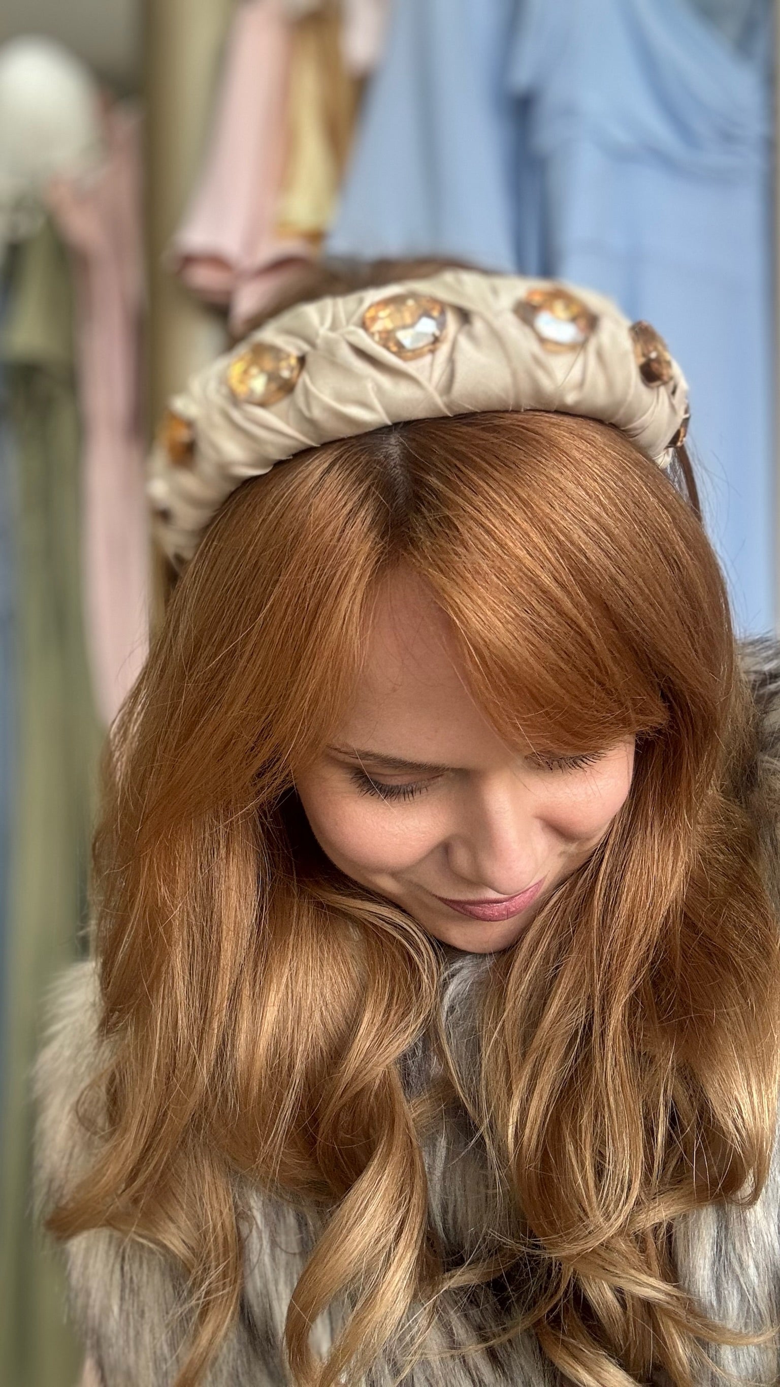 Lady wearing nude beige silk headband with crystals