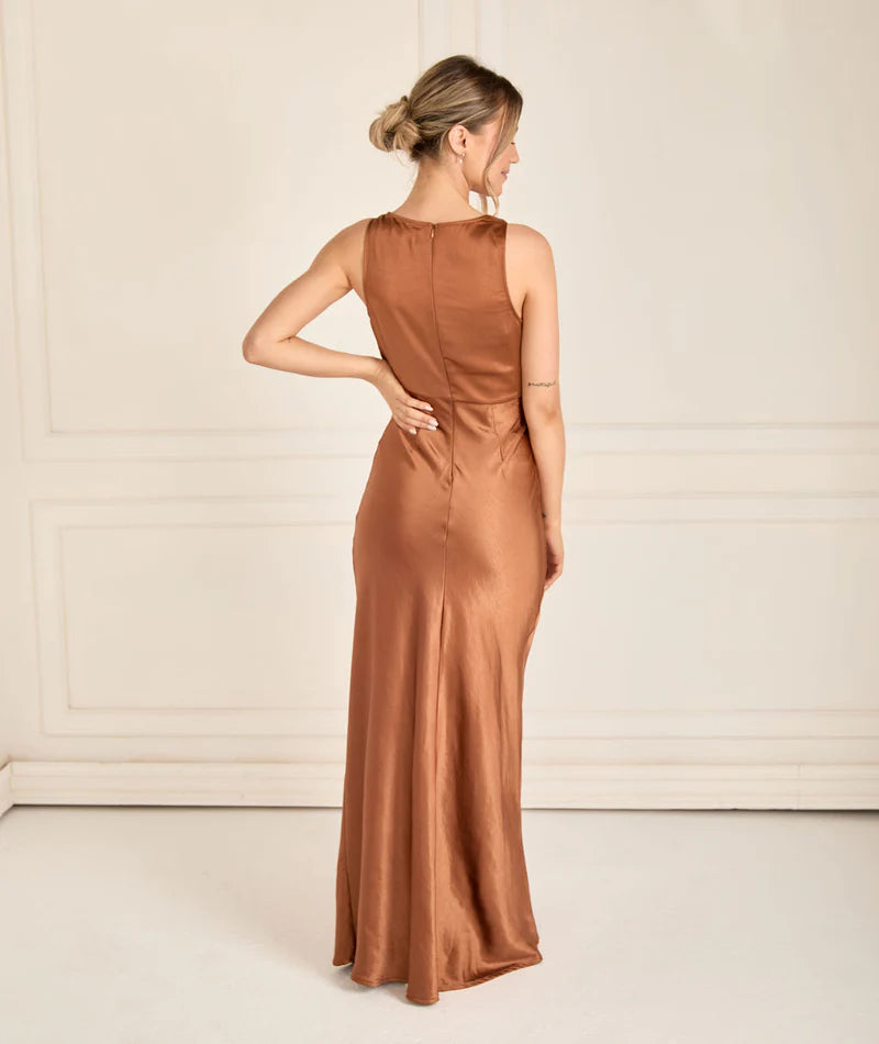 woman wearing satin bridesmaid dress in rust bronze with cowl neck