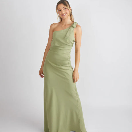 lady wearing crepe bow one shoulder bridesmaid dress in sage green