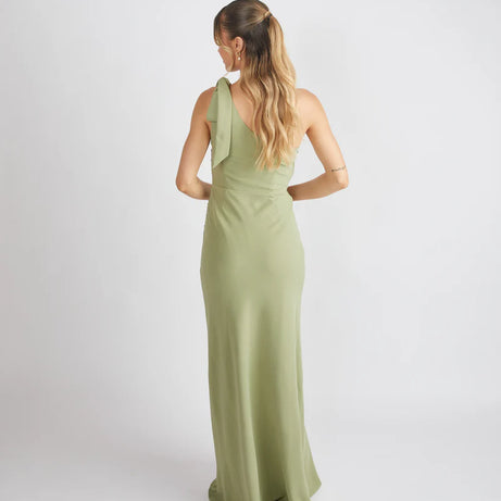 lady wearing crepe bow one shoulder bridesmaid dress in sage green