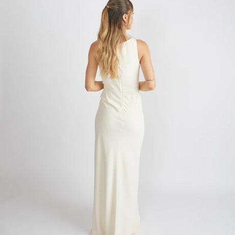 Girl wearing Six Stories Crepe Almond Bridesmaid dress