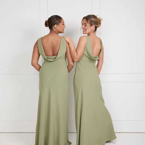 Two girls wearing sage green crepe bridesmaid dress with cowl back