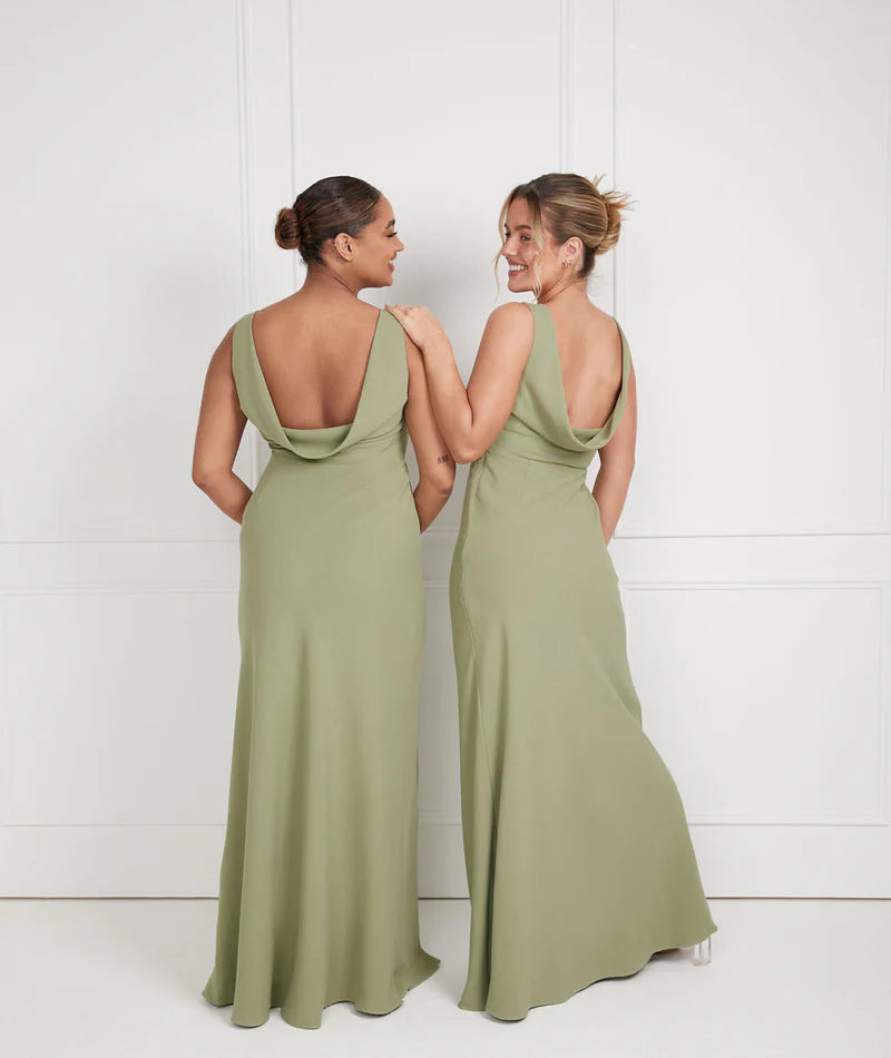 Two girls wearing sage green crepe bridesmaid dress with cowl back