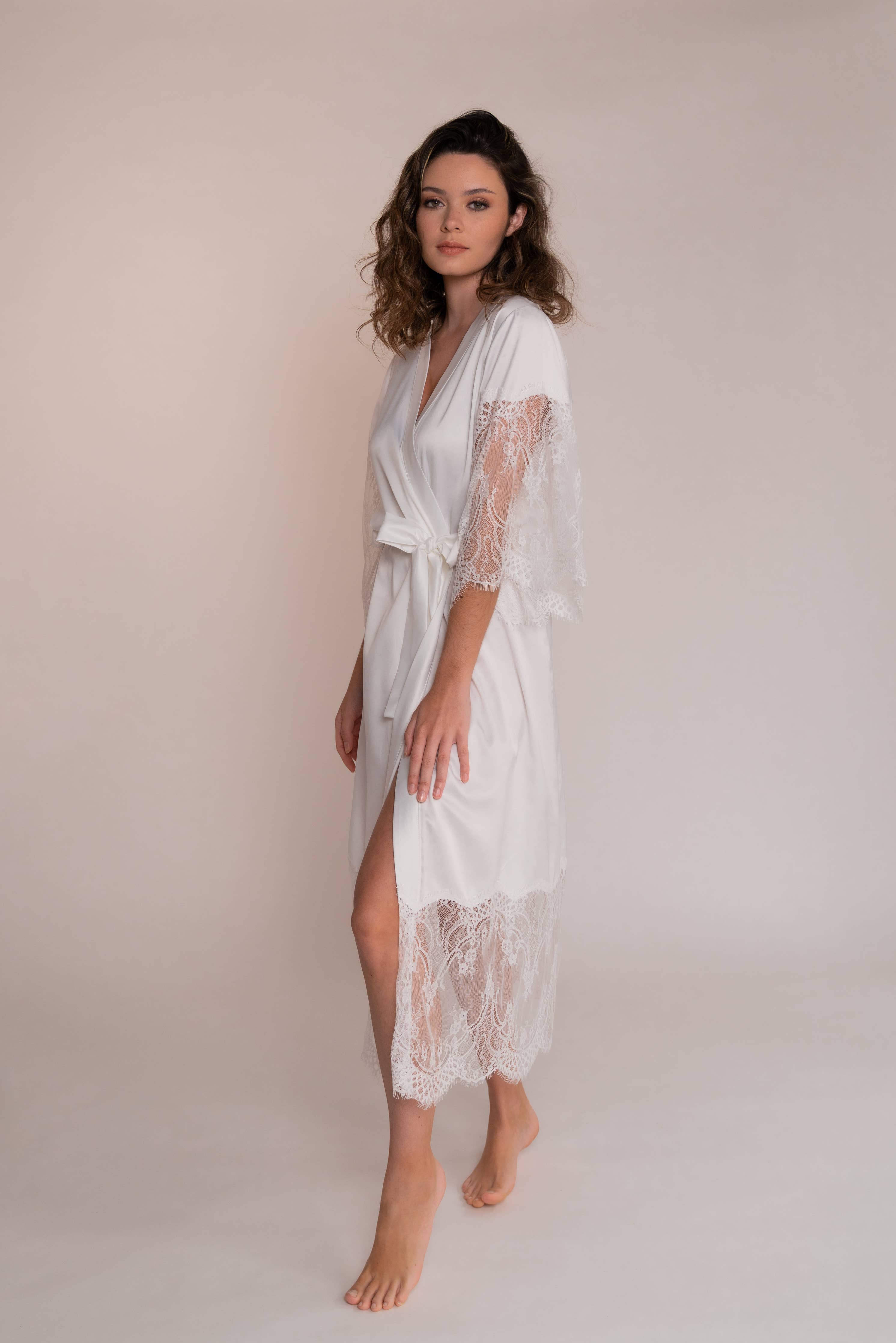 The Anais Bridal robe, a luxury white satin and lace bridal robe for those extra special wedding moments. Capture your feminine essence perfectly with this best selling bridal accessory.
