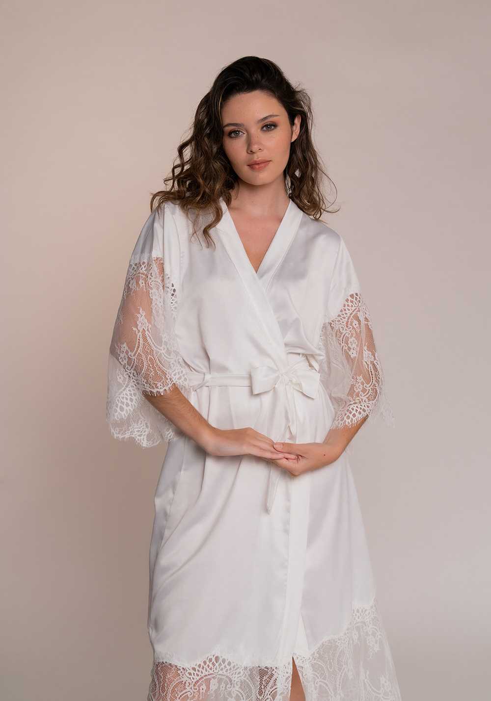 The Anais Bridal robe, a luxury white satin and lace bridal robe for those extra special wedding moments. Capture your feminine essence perfectly with this best selling bridal accessory.