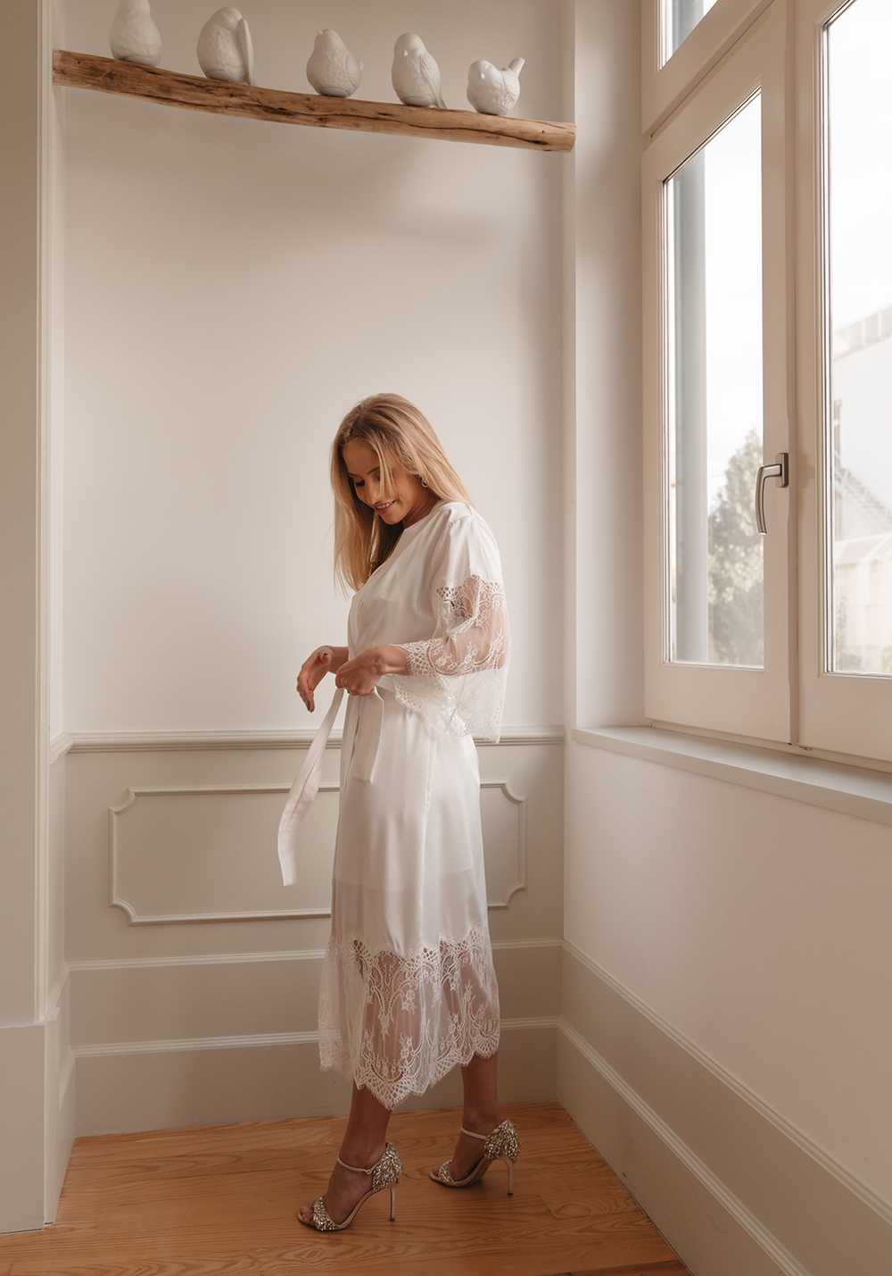 The Anais Bridal robe, a luxury white satin and lace bridal robe for those extra special wedding moments. Capture your feminine essence perfectly with this best selling bridal accessory.