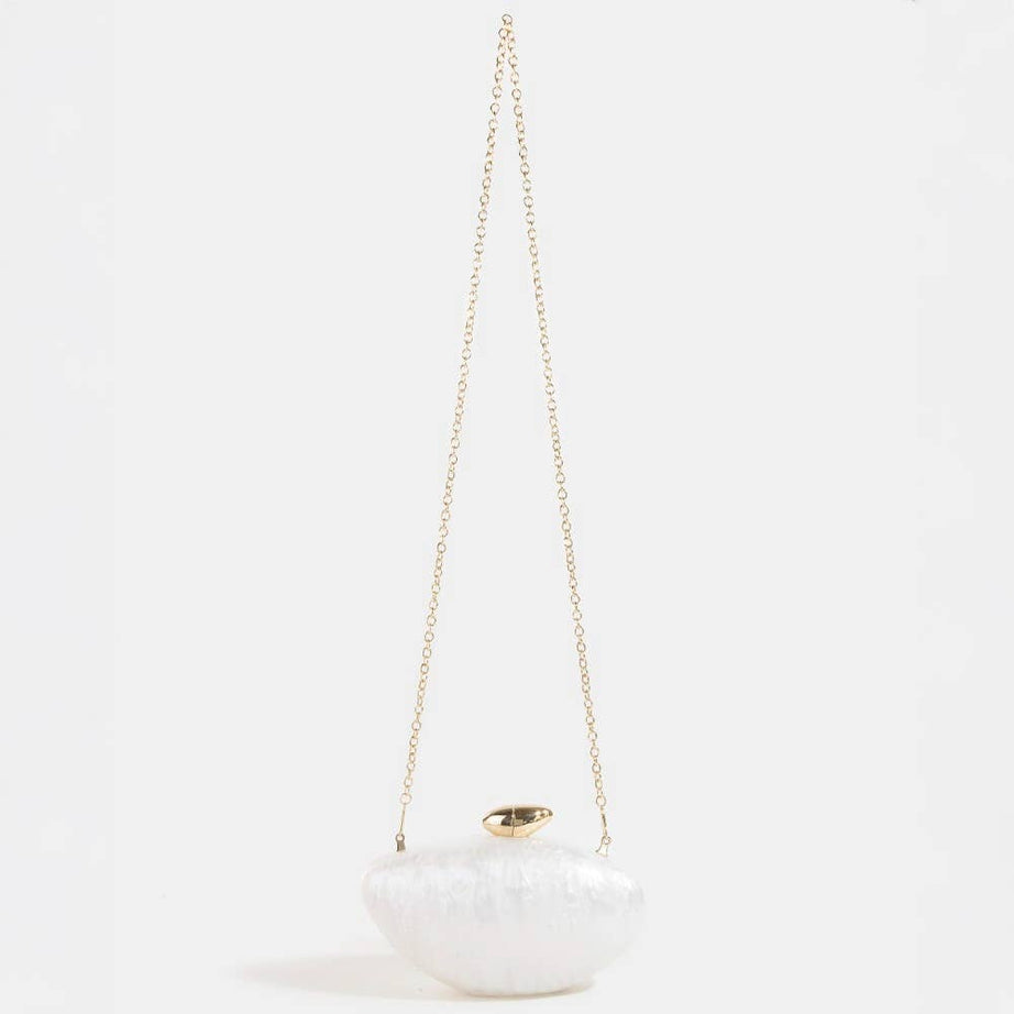 White pearlescent bridal clutch bag  on a white background