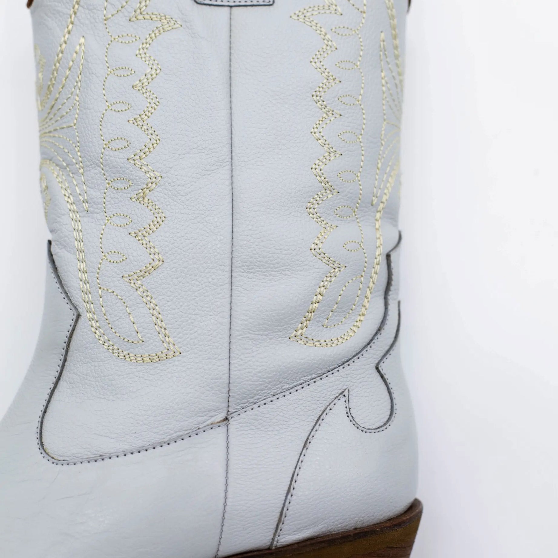 Introducing the Luna Authentic &amp; Original Cowboy Boot — a handcrafted statement piece designed for unstoppable style, comfort, and individuality. The Luna boot is where rustic tradition meets modern elegance, offering a fresh twist on the timeless cowboy boot silhouette. Whether you're walking down the aisle or dancing under the stars, Luna brings a unique edge to your look with artisanal detailing and heritage craftsmanship.