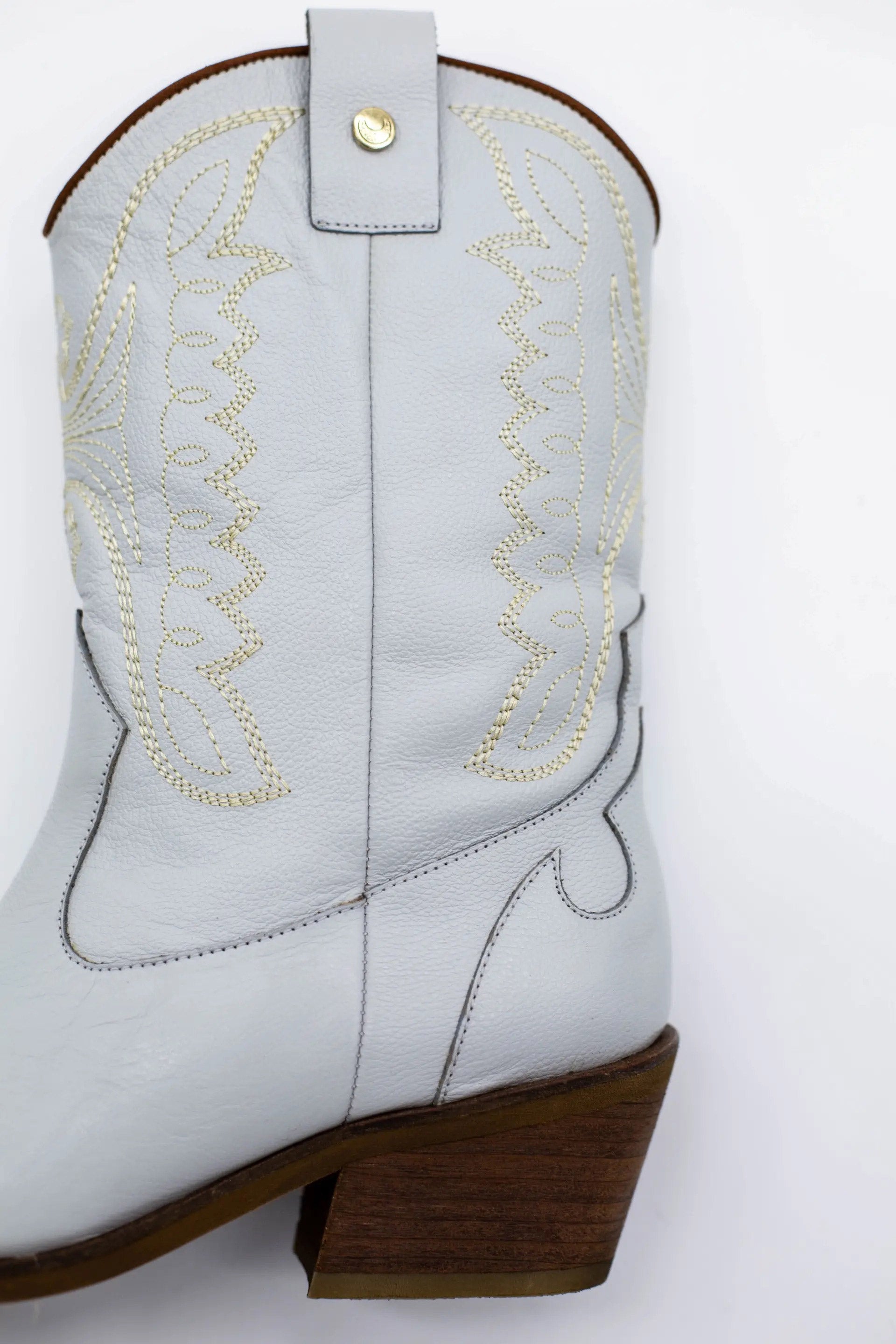 Introducing the Luna Authentic &amp; Original Cowboy Boot — a handcrafted statement piece designed for unstoppable style, comfort, and individuality. The Luna boot is where rustic tradition meets modern elegance, offering a fresh twist on the timeless cowboy boot silhouette. Whether you're walking down the aisle or dancing under the stars, Luna brings a unique edge to your look with artisanal detailing and heritage craftsmanship.